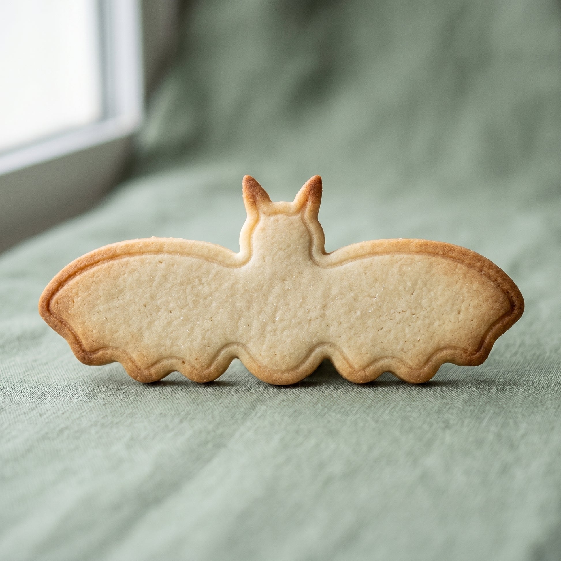 Bat shaped sugar cookie